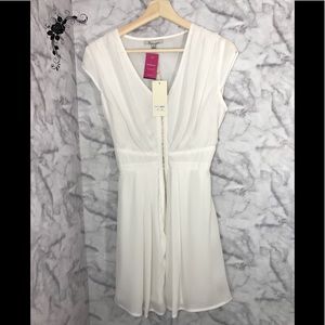 the clothing company Sheer White Dress